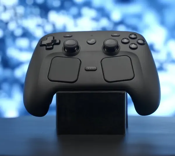 Steam Controller on a pedestal with sparkling blue background