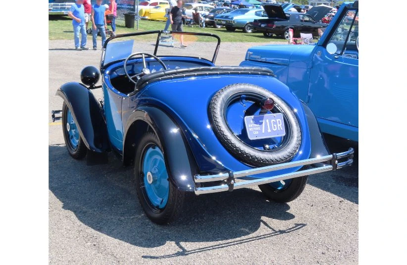Rear of blue  1931 American Austin roadster 