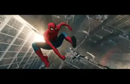 Spider-Man swings high above New York City, suspended on webbing between skyscrapers in "Spider-Man: Brand New Day." The sun beams dramatically, capturing a sense of action and adventure.