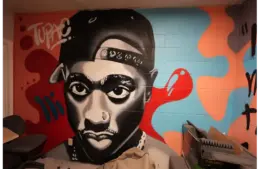 A mural of Tupac Shakur lines the wall in one of the VOICES rooms Wednesday, June 8, 2022, at VOICES in Indianapolis. The mural reflects a young black man whose message resonates with many of those at VOICES youth center. Blackfatherhoodonjuneteenth Mb 11