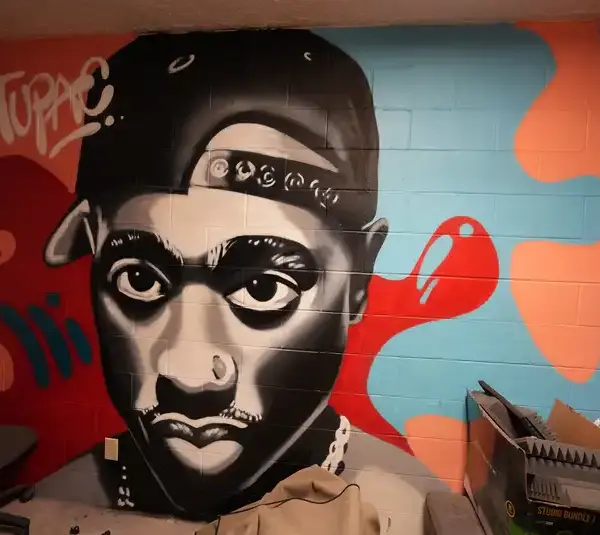 A mural of Tupac Shakur lines the wall in one of the VOICES rooms Wednesday, June 8, 2022, at VOICES in Indianapolis. The mural reflects a young black man whose message resonates with many of those at VOICES youth center. Blackfatherhoodonjuneteenth Mb 11