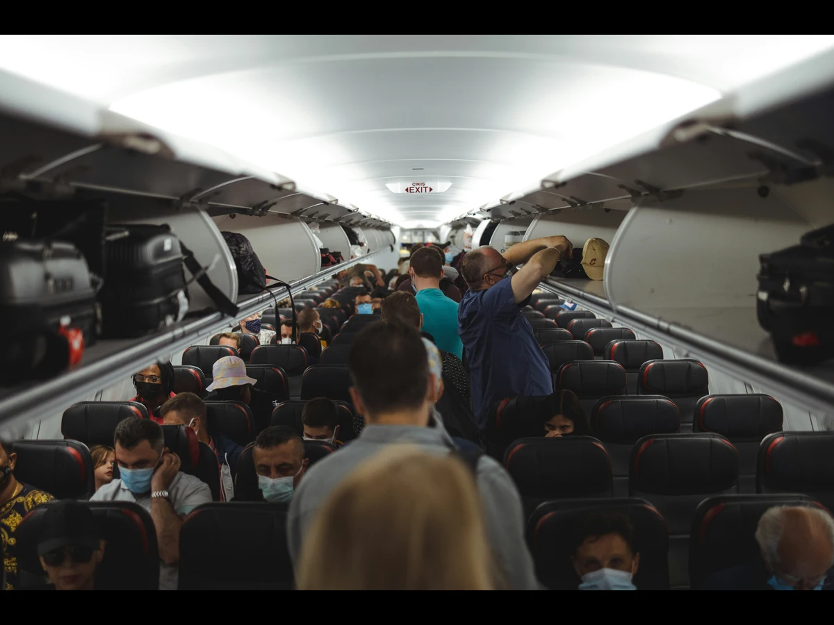 passengers on an airplane, united airlines