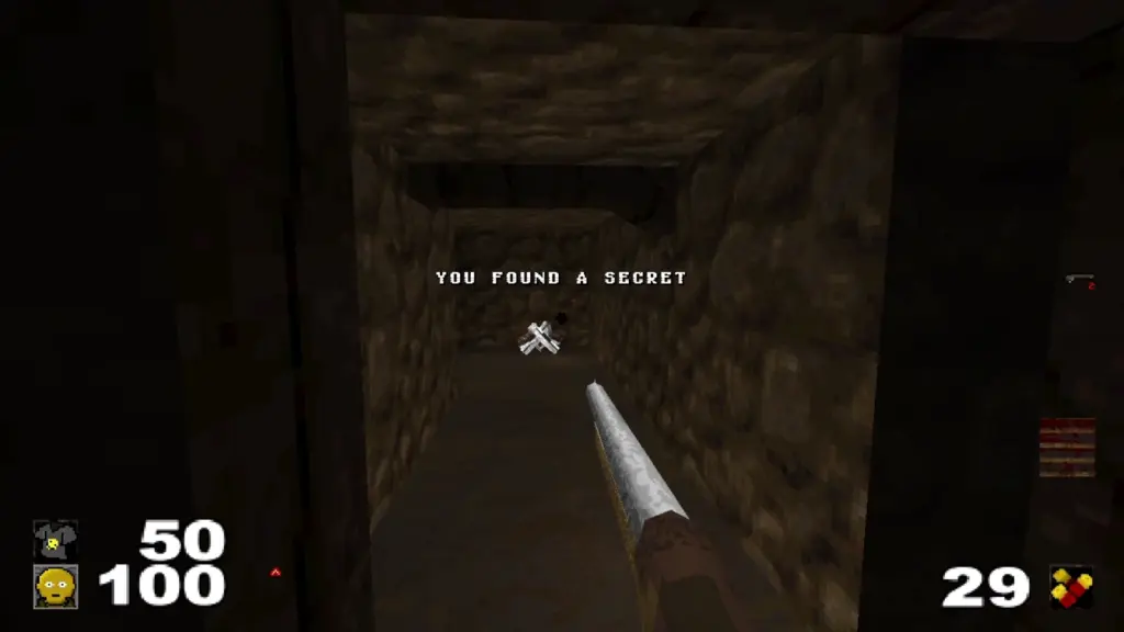In-game screenshot from FLESHCANCER finding the pair of pistols in a secret area from the first map in a narrow hallway that looks to be made of dirt