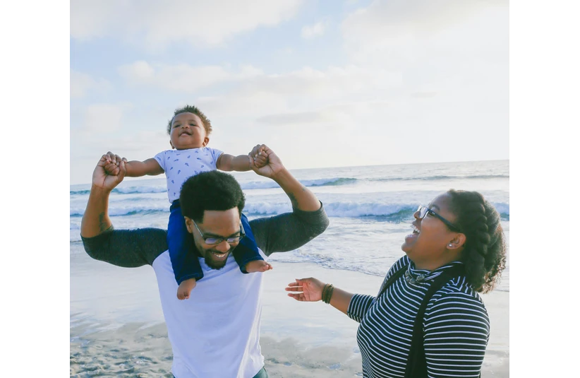 A family enjoying time at the beach.