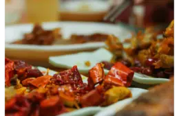 Vibrant and spicy Asian dishes featuring chili peppers, perfect for culinary enthusiasts embracing the spicy craze.