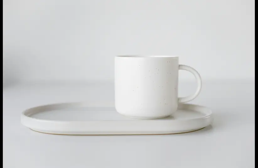 In daily devotional, a clean cup and platter are shown. 
