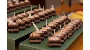 rich chocolate dessert squares topped with cream, perfect for any sweet table and a flawless match for mini desserts lovers everywhere.