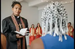 In daily devotional, a church leader speaks to a parishoner.
