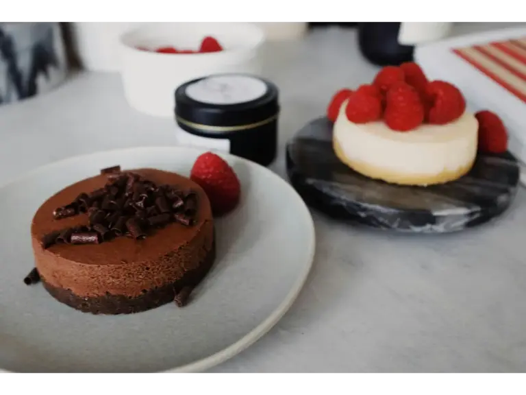 Indulgent chocolate mousse and raspberry cheesecake desserts with rich flavors, perfect for anyone who loves treating themselves to mini desserts with big personality.