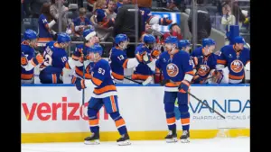 Apr 12, 2026; Elmont, New York, USA; New York Islanders center Casey Cizikas (53) and defenseman Scott Mayfield (24) celebrate a goal against the Montreal Canadiens in the third period at UBS Arena. Mandatory Credit: Alexander Wohl-Imagn Images