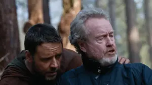 Ridley Scott and Russell Crowe discussing movie magic on set.