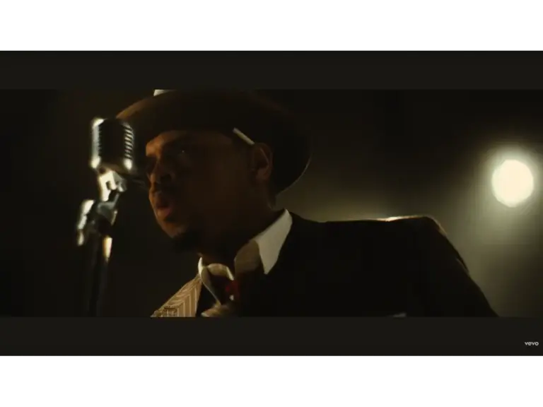 Chris Brown singing in the Fallen music video.