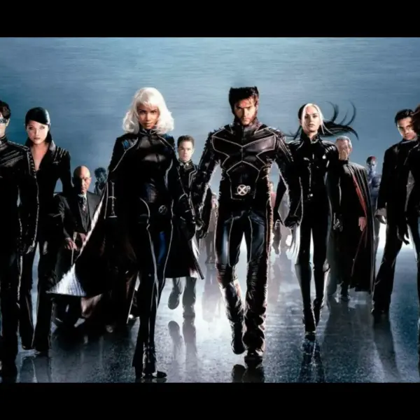 The X-Men in X2: X-Men United walk confidently forward against a blue backdrop. The tone is bold and powerful.