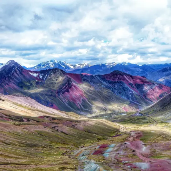 Stunning view of Rainbow Mountain in the Andes, showcasing vibrant colors and sweeping landscapes shaped by the kind of unusual nature that doesn’t even look real.