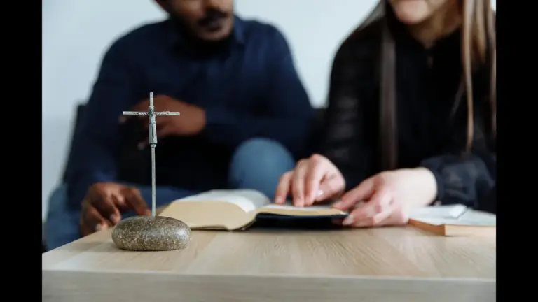 In daily devotional, a man and woman are studying the scriptures together.