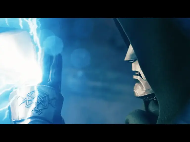 A close-up of Doctor Doom from "Avengers: Doomsday" in a dark hood, with a metallic mask, raising a hand from which lightning is emanating, set against a blurred blue background.