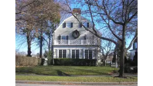 “The house featured in The Amityville Horror—the center of the Amityville mystery