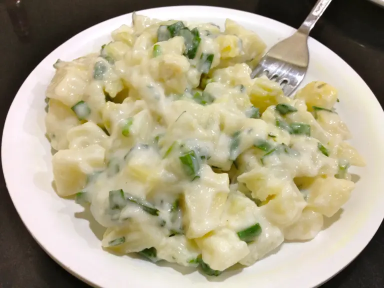 Cold viral potato salad served at a restaurant, showcasing that viral potato charm in every creamy, chilled bite.