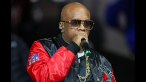 Nov 26, 2023; Atlanta, Georgia, USA; Rapper and entertainer Jermaine Dupri prepares to perform during a game between the Atlanta Falcons and New Orleans Saints in the second quarter at Mercedes-Benz Stadium.