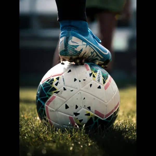 Player standing on a soccer ball during the 2026 World Cup.