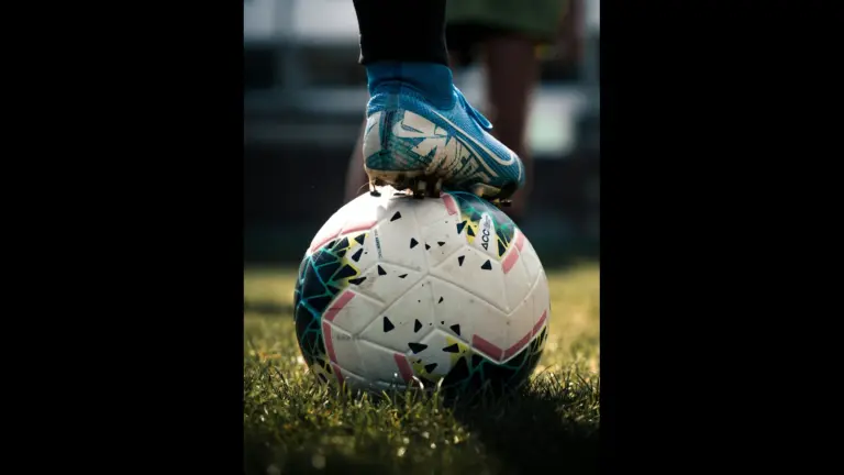 Player standing on a soccer ball during the 2026 World Cup.