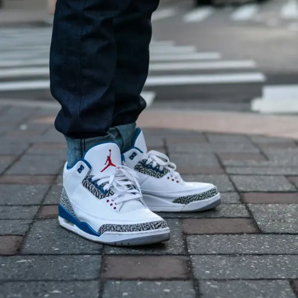 Air Jordan street‑style photo showcasing bold energy and strong true blue vibes that stand out effortlessly.