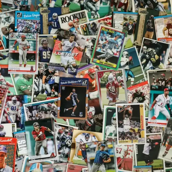 Assorted baseball cards, basketball cards, hockey cards, soccer cards, football cards, sports