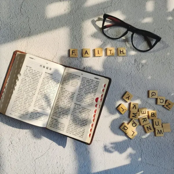 in Monday's daily devotional, an open Bible is shown with the block letters that spell out FAITH