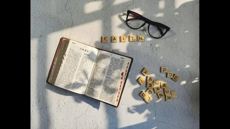 in Monday's daily devotional, an open Bible is shown with the block letters that spell out FAITH