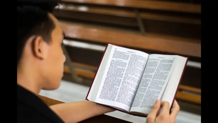 In Friday's daily devotional, a young man reads Scripture in silence.