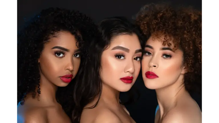 Close‑up portrait of diverse women with striking red lips, emphasizing beauty, confidence, and the subtle makeup tricks that make every feature stand out.