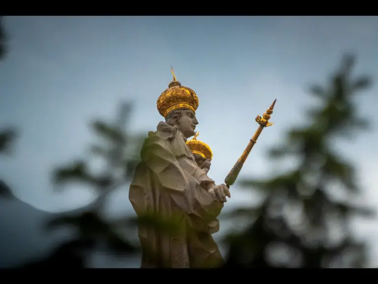 A statue symbolic of Christian virtues hold the sword of the Spirit, representing God's word.