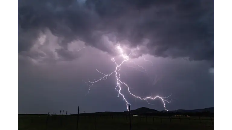 Stunning capture of a powerful lightning storm, glowing with raw atmospheric energy that mirrors the intense, instinctive pull of weather intuition.