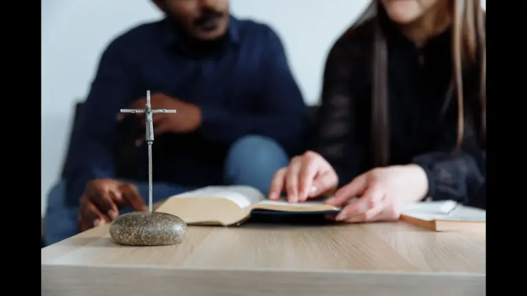 In daily devotional, two people study God's word together.