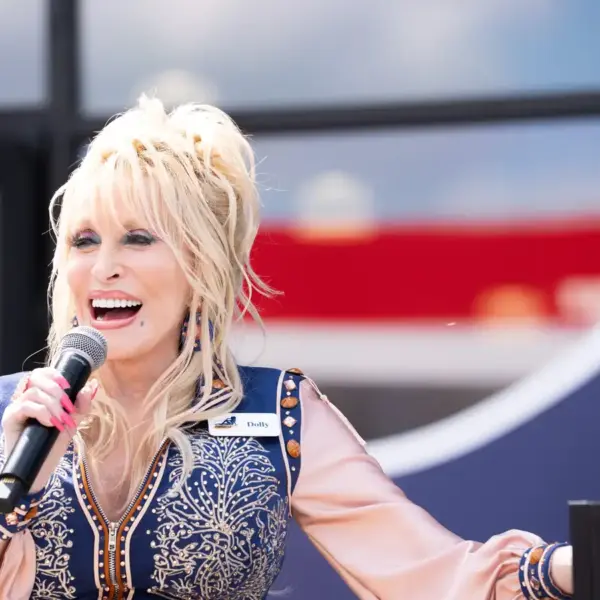 Dolly Parton speaks to the crowd during the grand opening of Dolly's Tennessean Travel Stop in Cornersville on Wednesday June 24, 2026.