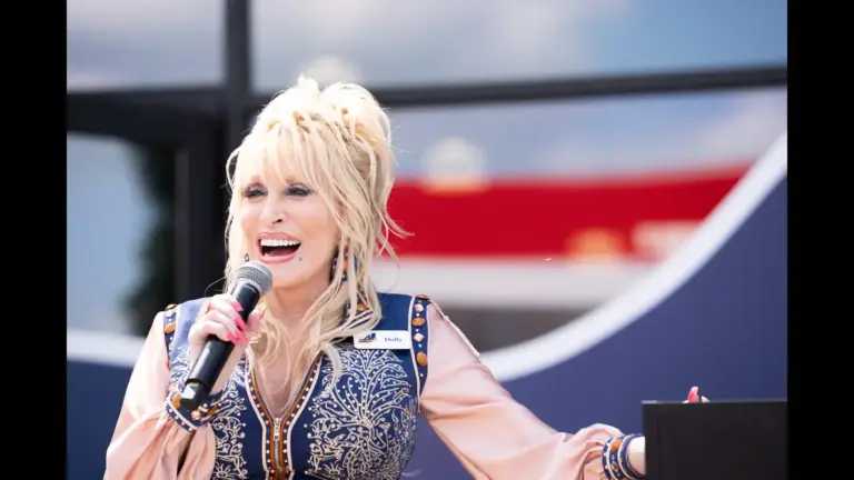 Dolly Parton speaks to the crowd during the grand opening of Dolly's Tennessean Travel Stop in Cornersville on Wednesday June 24, 2026.