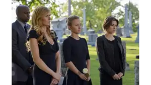 Hayden Panettiere, Connie Britton, Kourtney Hansen, and Melvin Ray Kearney II from Nashville in funeral attire for the Season 2 premier of Jolene's passing