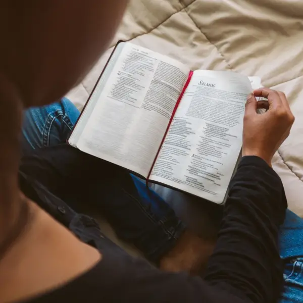 In Thursday's daily devotional, a young woman reads the Bible.