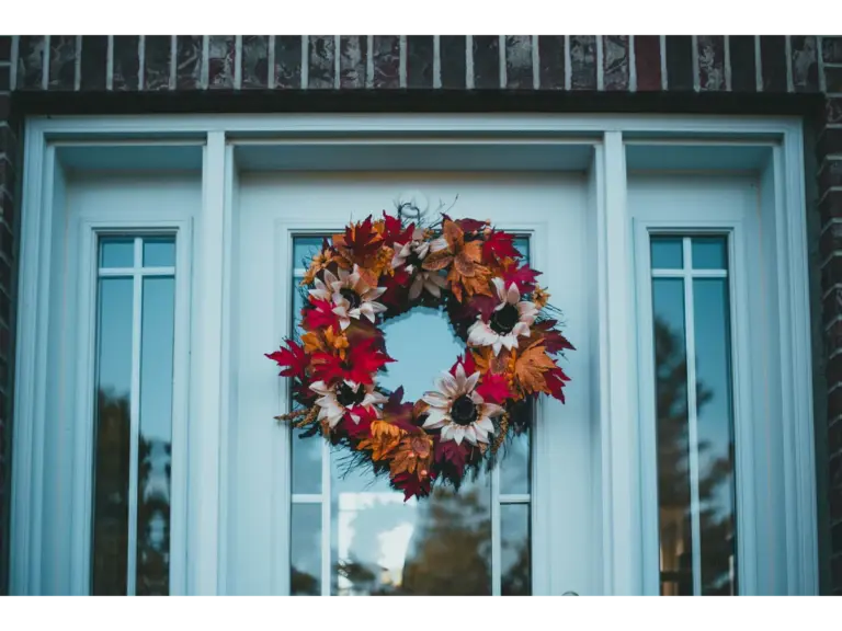 Colorful fall wreath on a front door, capturing fall's festive charm