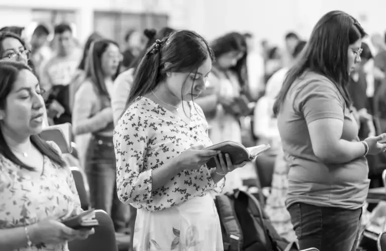 In Wednesday's daily devotional, a group studies Scripture together.