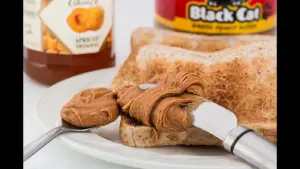 An image of toast and various accompaniments to spread on it