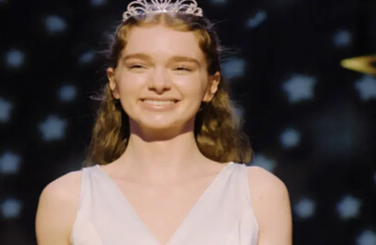 Carrie is wearing a prom dress and crown in Amazon Prime Video's Carrie miniseries