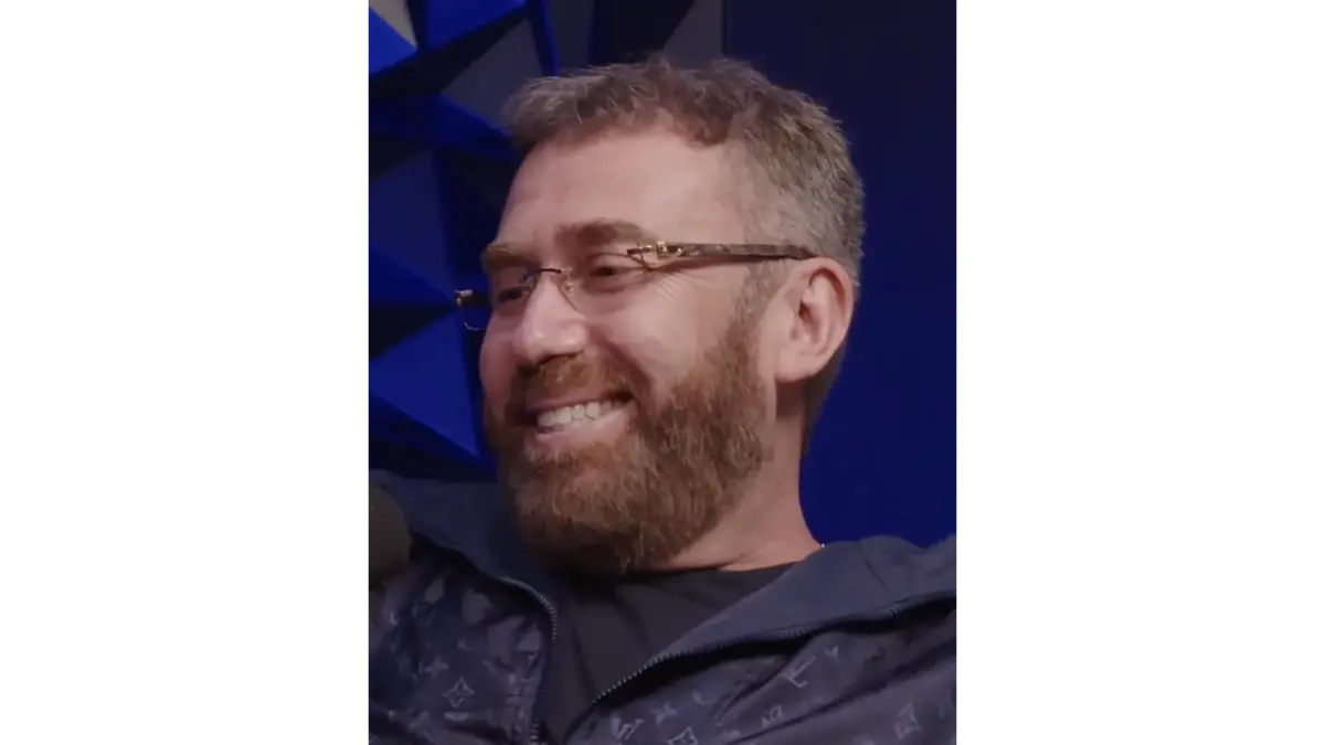 Vlad smiling during a VladTV sit‑down, reflecting the candid, revealing nature of Confessional Interviews in hip‑hop culture.