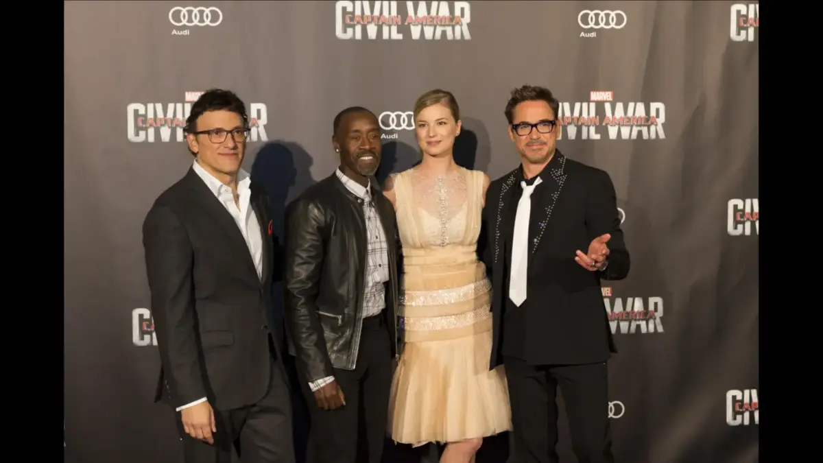 Don Cheadle, Robert Downey Jr., Anthony Russo, and Emily VanCamp attend the premiere of Captain America: Civil War in 2016.
