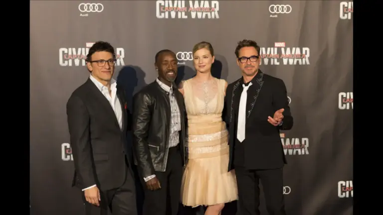 Don Cheadle, Robert Downey Jr., Anthony Russo, and Emily VanCamp attend the premiere of Captain America: Civil War in 2016.