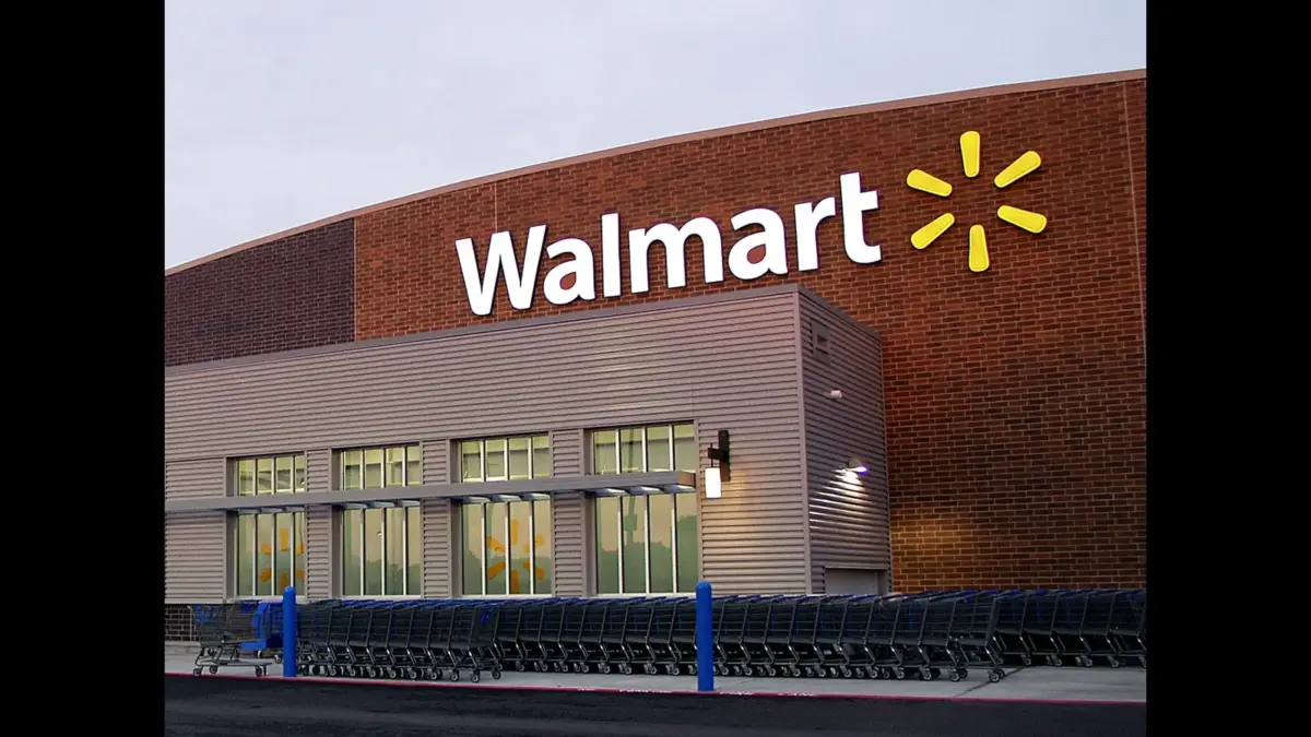 Walmart store exterior with shopping carts.