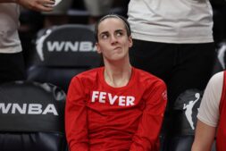 Caitlin Clark, whose Nike Caitlin Clark shoe launched Oct. 1, stands on the Indiana Fever sideline in 2024