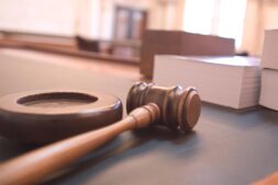 A judge's gavel on a wooden block, illustrating the Eric Weinberg trial in Los Angeles