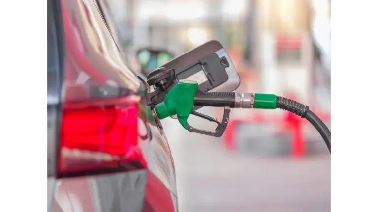 Fuel pump nozzle in a car, as Europe diesel reserves draw U.S. pressure over record fuel prices