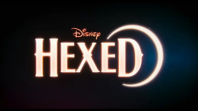 Disney’s glowing “Hexed” title appears in pale peach on a dark background, with a crescent moon around the final D, evoking a magical, mysterious mood.